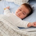 baby, baby sleeping, how to get baby to sleep through the night, night feeds, baby in cot, baby sleeping, baby sleeping through the night